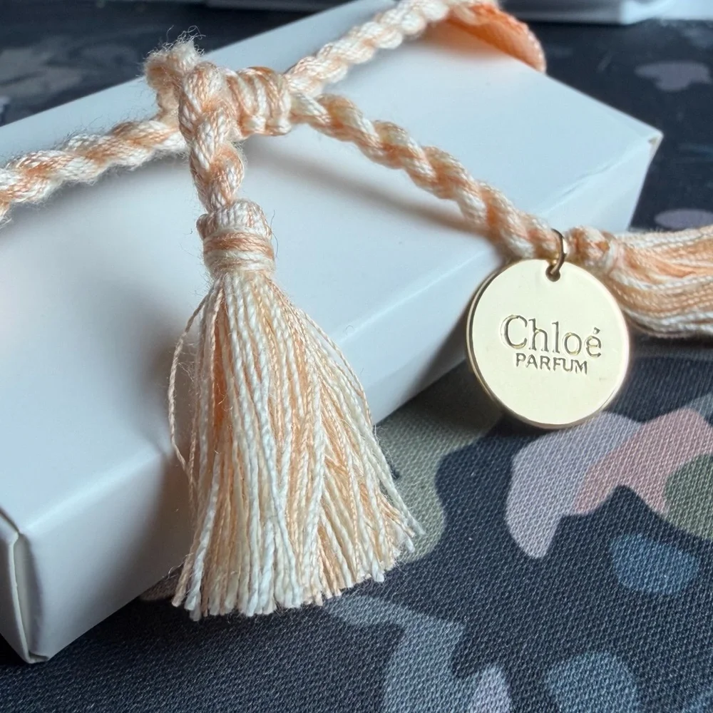 Chloé Authentic “I AM CHLOE”Parfum Peach Woven Tassle Adjustable Bracelet (BNIB) - Picture 4 of 6